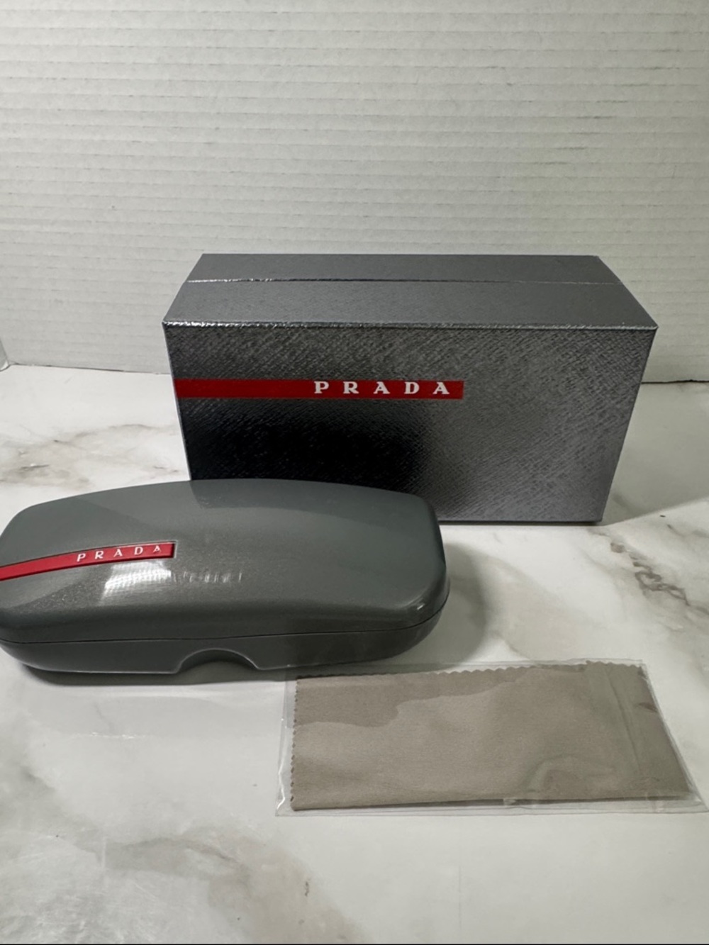 Authentic Prada Gray Eyeglasses Case with Box and Cloth. Preloved.